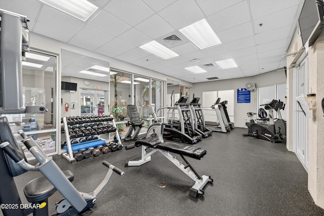 4650 Links Village Dr Unit C402, Ponce Inlet, FL 32127 - exercise room featuring a paneled ceiling