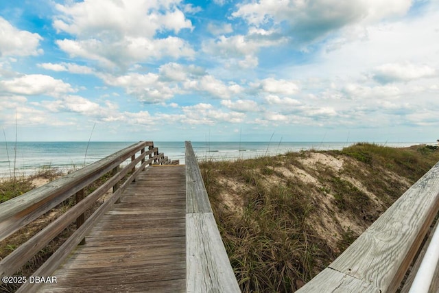 4650 Links Village Dr Unit C402, Ponce Inlet, FL 32127 - surrounding community featuring view of water and beach