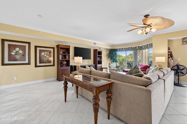 4650 Links Village Dr Unit C402, Ponce Inlet, FL 32127 - living room featuring a ceiling fan, light marble finish flooring, and ornamental molding