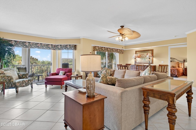 4650 Links Village Dr Unit C402, Ponce Inlet, FL 32127 - living room with ornamental molding, ceiling fan, light tile patterned flooring, and a textured ceiling