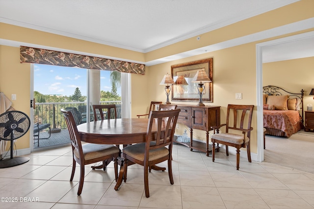 4650 Links Village Dr Unit C402, Ponce Inlet, FL 32127 - dining area with ornamental molding and baseboards