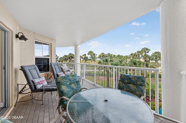 4650 Links Village Dr Unit C402, Ponce Inlet, FL 32127 - balcony featuring outdoor dining area
