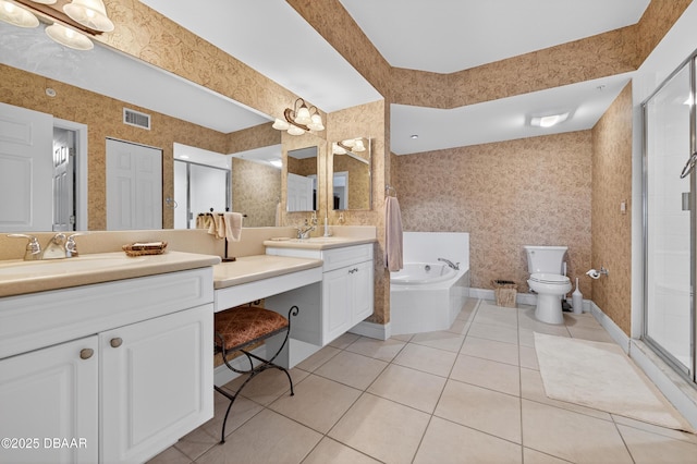 4650 Links Village Dr Unit C402, Ponce Inlet, FL 32127 - bathroom featuring tile patterned flooring, vanity, a bath, and a shower stall