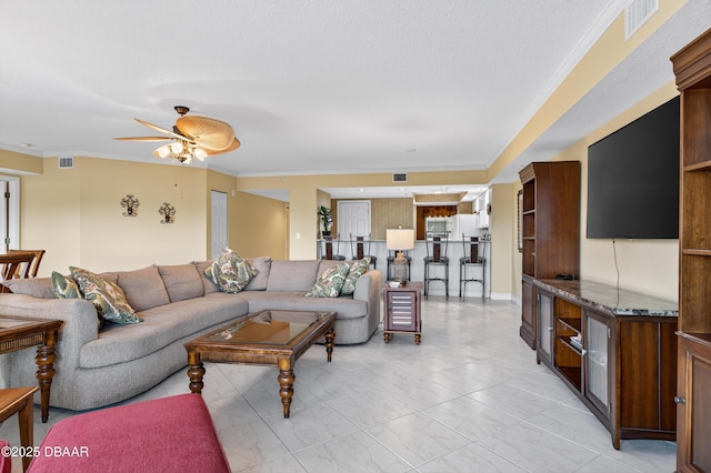 4650 Links Village Dr Unit C402, Ponce Inlet, FL 32127 - living area with ceiling fan, crown molding, and light marble finish floors
