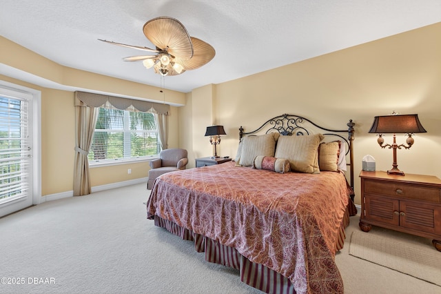 4650 Links Village Dr Unit C402, Ponce Inlet, FL 32127 - bedroom with carpet, access to exterior, and ceiling fan