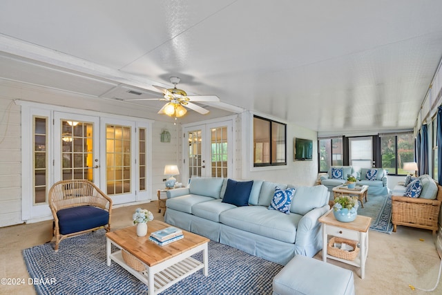 sunroom with french doors and ceiling fan