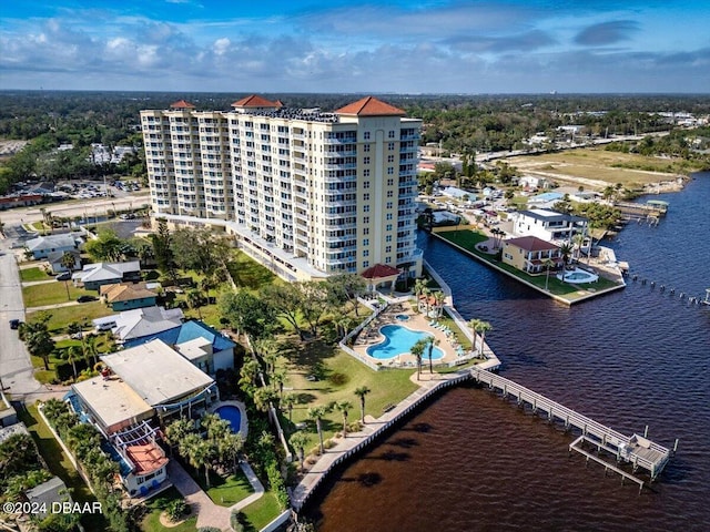 birds eye view of property with a water view