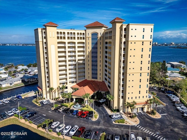 view of building exterior featuring a water view