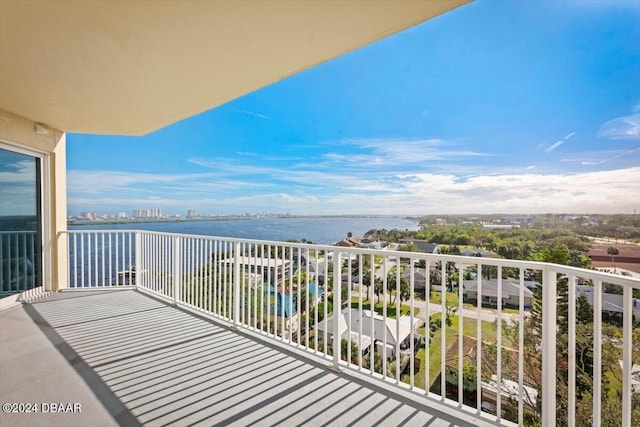 balcony featuring a water view