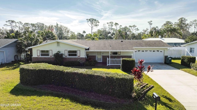 ranch-style home with a garage and a front yard