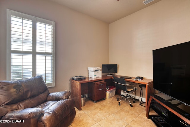 home office with light tile patterned floors