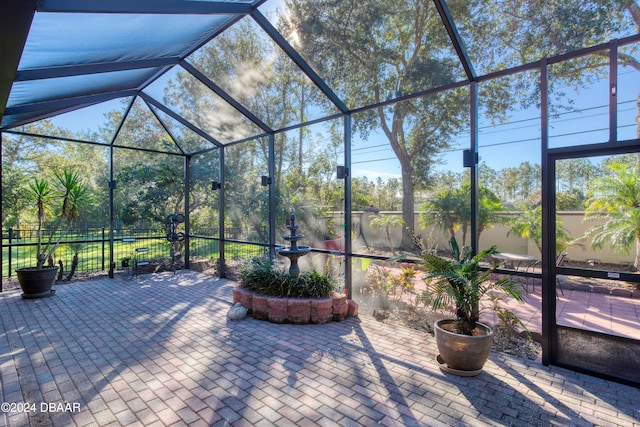 view of patio / terrace with a lanai