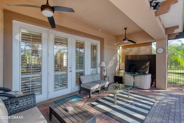 view of patio / terrace featuring ceiling fan