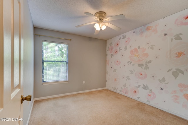 209 Tarracina Way, Daytona Beach, FL 32117 - empty room featuring baseboards, ceiling fan, a textured ceiling, and light colored carpet