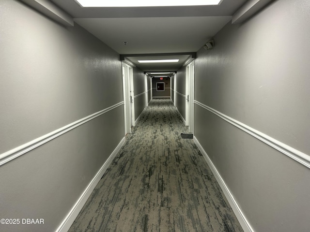 1909 S Atlantic Ave Unit 213, Daytona Beach, FL 32118 - hall featuring wood finished floors and baseboards