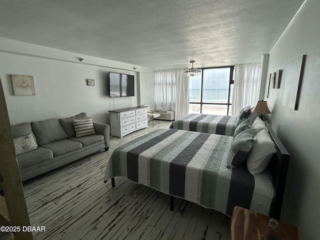 1909 S Atlantic Ave Unit 213, Daytona Beach, FL 32118 - bedroom with a textured ceiling
