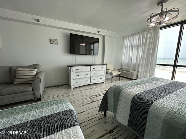 1909 S Atlantic Ave Unit 213, Daytona Beach, FL 32118 - bedroom featuring wood finished floors