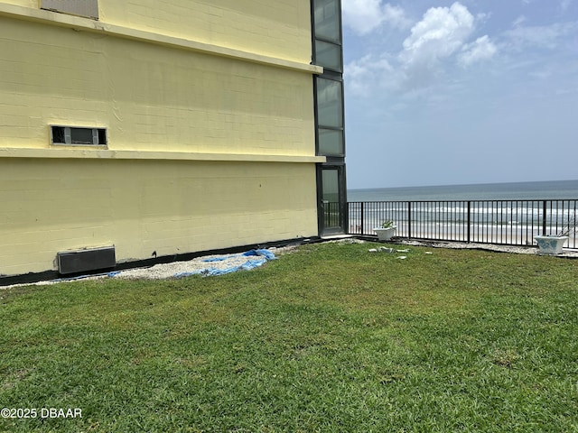 1909 S Atlantic Ave Unit 213, Daytona Beach, FL 32118 - view of green lawn featuring a water view