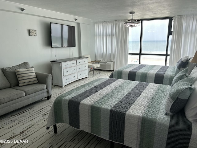 1909 S Atlantic Ave Unit 213, Daytona Beach, FL 32118 - bedroom featuring light wood-type flooring