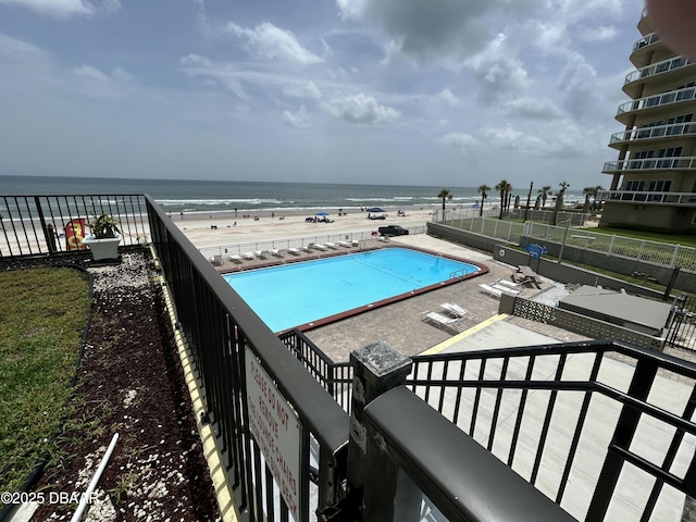 1909 S Atlantic Ave Unit 213, Daytona Beach, FL 32118 - community pool with a patio area and a water view