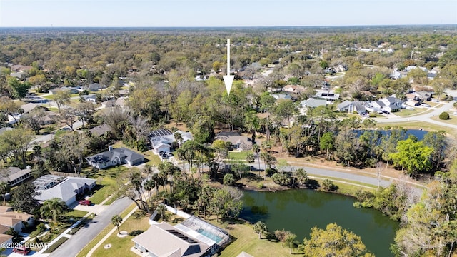 birds eye view of property with a residential view and a water view