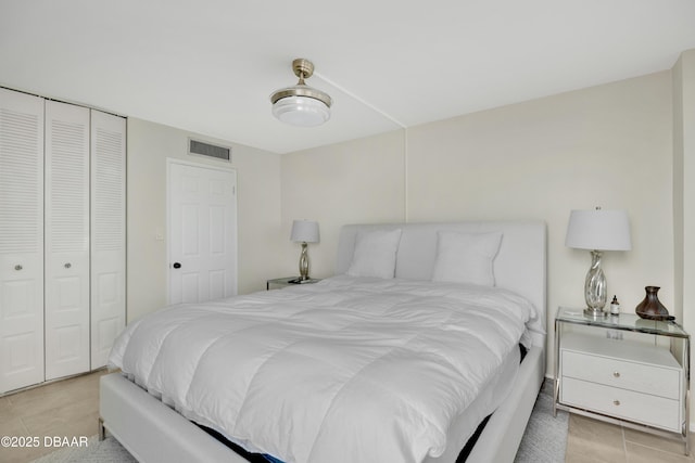 2947 S Atlantic Ave Unit 601, Daytona Beach, FL 32118 - bedroom featuring light tile patterned floors and a closet