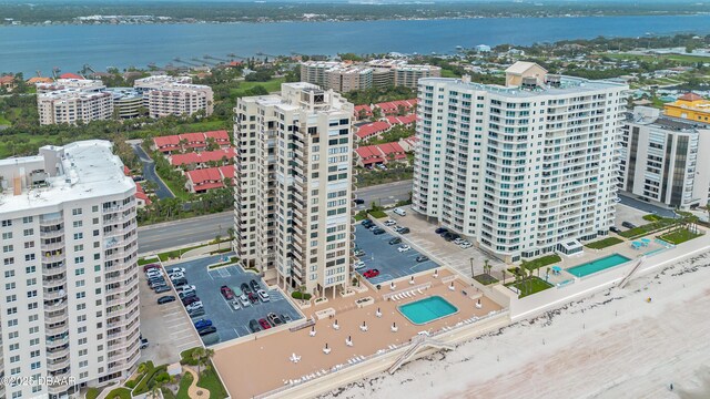 2947 S Atlantic Ave Unit 601, Daytona Beach, FL 32118 - aerial view of a pool area and a nearby body of water