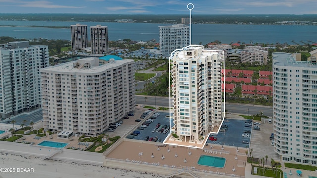 2947 S Atlantic Ave Unit 601, Daytona Beach, FL 32118 - view of urban area with a pool area and a large body of water