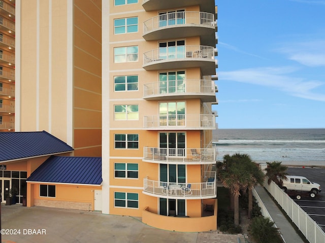 3721 S Atlantic Ave Unit 207, Daytona Beach Shores, FL 32118 - view of apartment building / complex featuring a water view