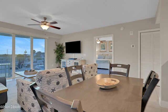3721 S Atlantic Ave Unit 207, Daytona Beach Shores, FL 32118 - dining area featuring a ceiling fan