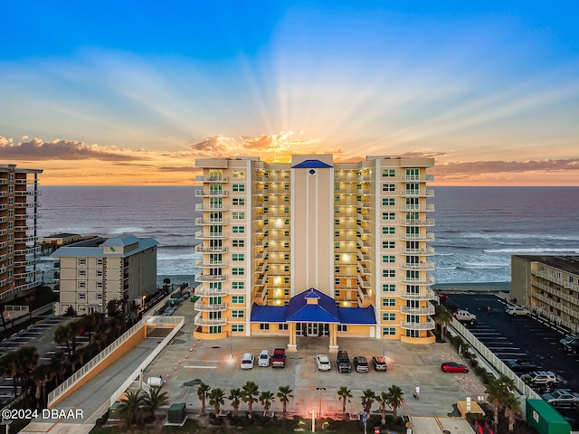 outdoor building at dusk with a water view