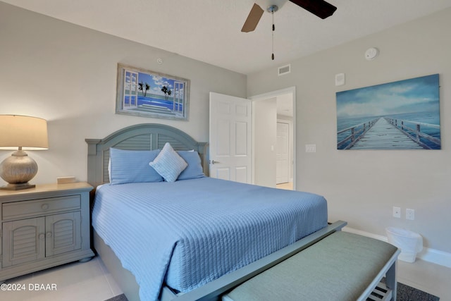 3721 S Atlantic Ave Unit 207, Daytona Beach Shores, FL 32118 - bedroom featuring baseboards and ceiling fan