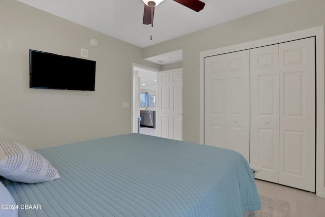 3721 S Atlantic Ave Unit 207, Daytona Beach Shores, FL 32118 - bedroom featuring a closet, a ceiling fan, and light tile patterned floors