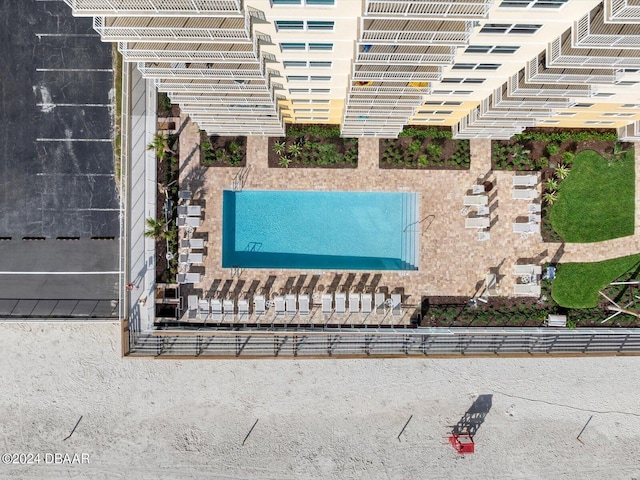 3721 S Atlantic Ave Unit 207, Daytona Beach Shores, FL 32118 - drone / aerial view of a pool area