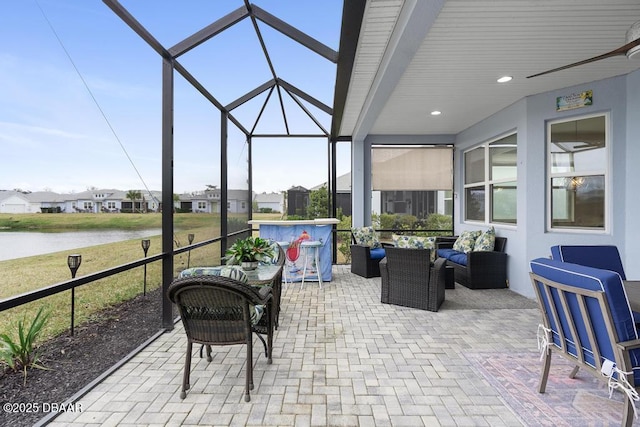 sunroom with a water view