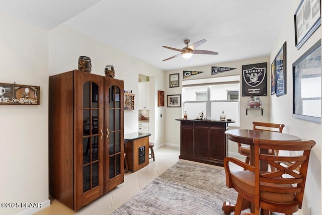 interior space featuring ceiling fan