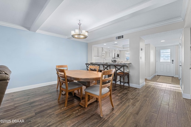 dining space with a chandelier, crown molding, beam ceiling, and dark hardwood / wood-style floors