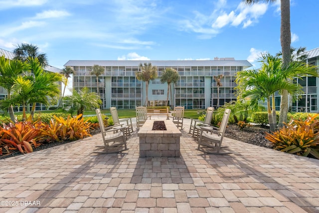 view of patio / terrace featuring a fire pit