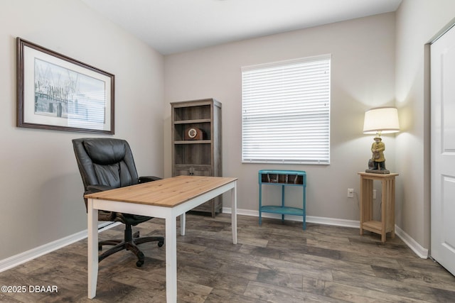 office area with baseboards and wood finished floors