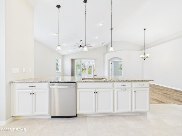 63 Park Place Cir, Palm Coast, FL 32164 - kitchen with stainless steel dishwasher, a sink, lofted ceiling, ceiling fan, and a chandelier