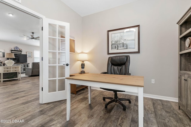 home office featuring french doors, lofted ceiling, a ceiling fan, wood finished floors, and baseboards