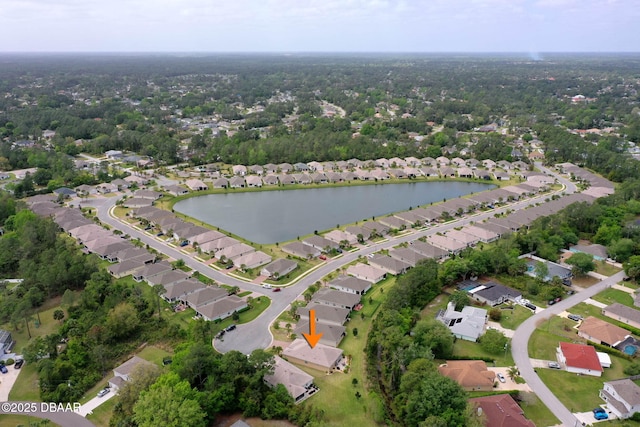 bird's eye view featuring a water view and a residential view