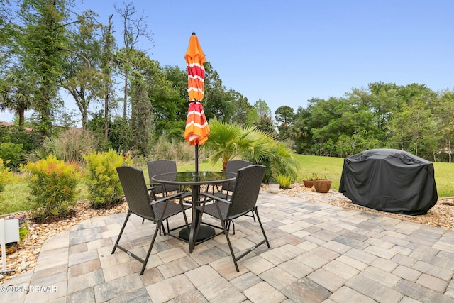 view of patio / terrace featuring outdoor dining area and area for grilling