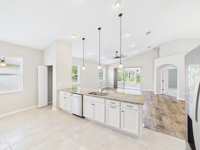 63 Park Place Cir, Palm Coast, FL 32164 - kitchen featuring dishwasher, a sink, ceiling fan, refrigerator with ice dispenser, and lofted ceiling