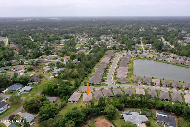 aerial view with a residential view and a water view