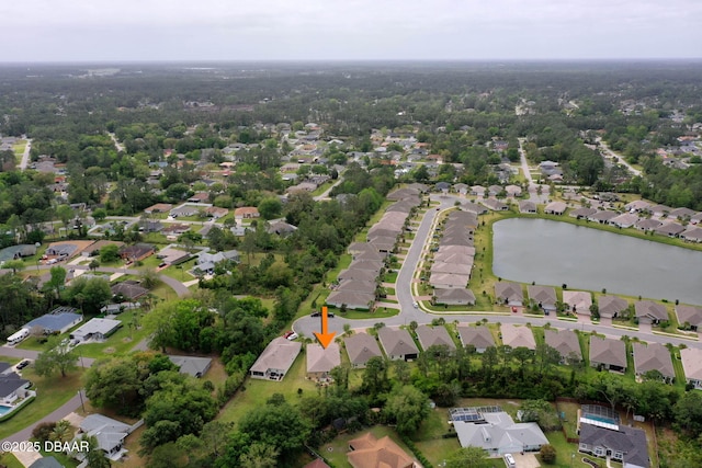 63 Park Place Cir, Palm Coast, FL 32164 - aerial view of property and surrounding area featuring nearby suburban area and a large body of water
