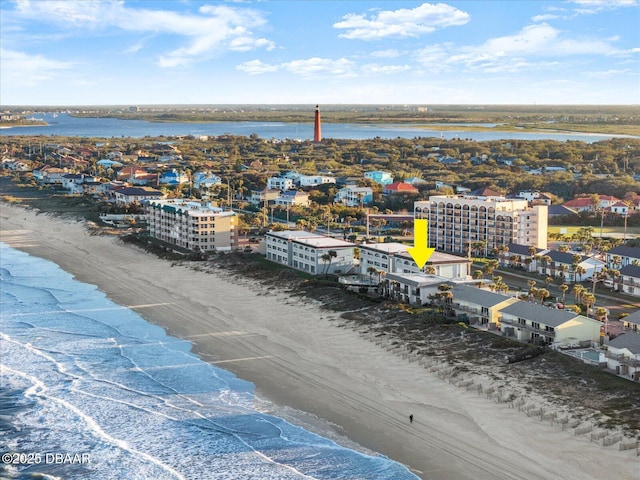 aerial view featuring a water view and a beach view