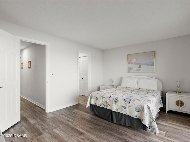 bedroom featuring hardwood / wood-style flooring