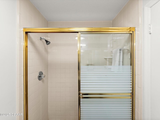 bathroom featuring an enclosed shower