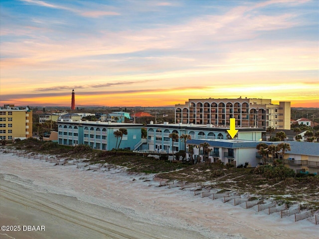 exterior space featuring a beach view